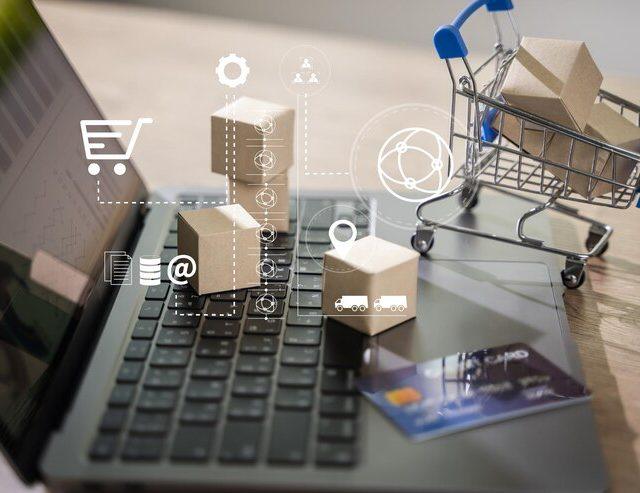 ecommerce-marketing-online-shopping-laptop-shopping-credit-card-payments-banking-online-paper-boxes_36325-4246